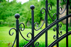 Adding Style and Utility to an Iron Fence with Trellis hercules custom iron