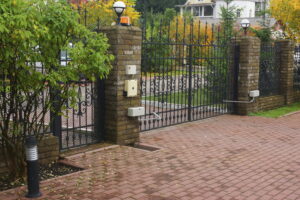 hercules custom iron fence installation in the summer